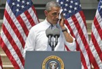 Associated Press/Charles Dharapak - President Barack Obama wipes perspiration from his face as he speaks about climate change