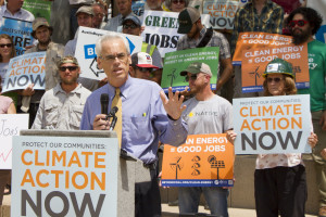Councilman Riley spoke about the need to action at Tuesday's Affordable Energy Rally in front of City Hall.  Photo by Al Braden.